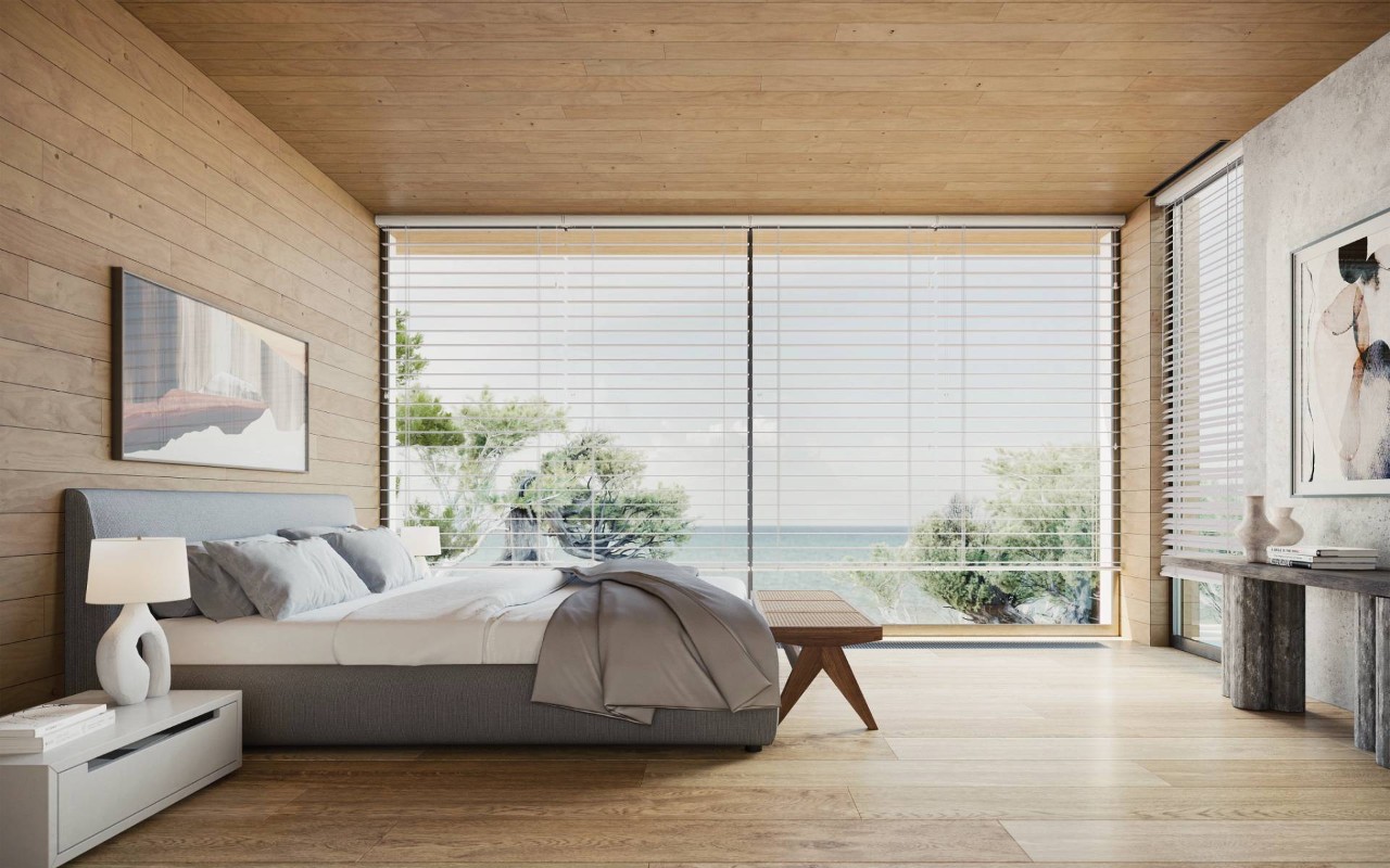 Wood-panelled Bedroom outfitted with outside-mounted white Hunter Douglas Modern Precious Metals® Metal Blinds near Cambridge, MD