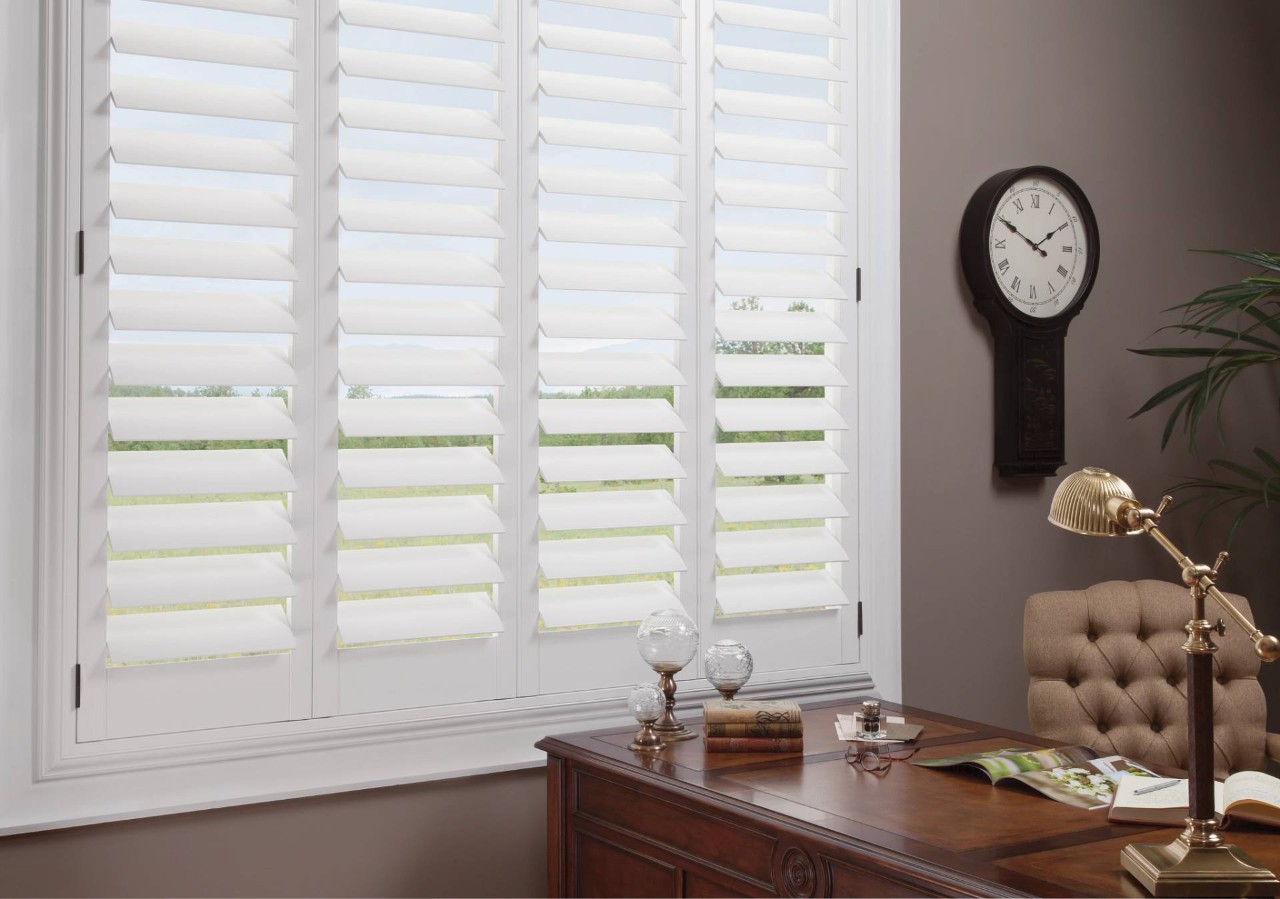 White hardwood shutters from Hunter Douglas decorating a home office near Cambridge, MD